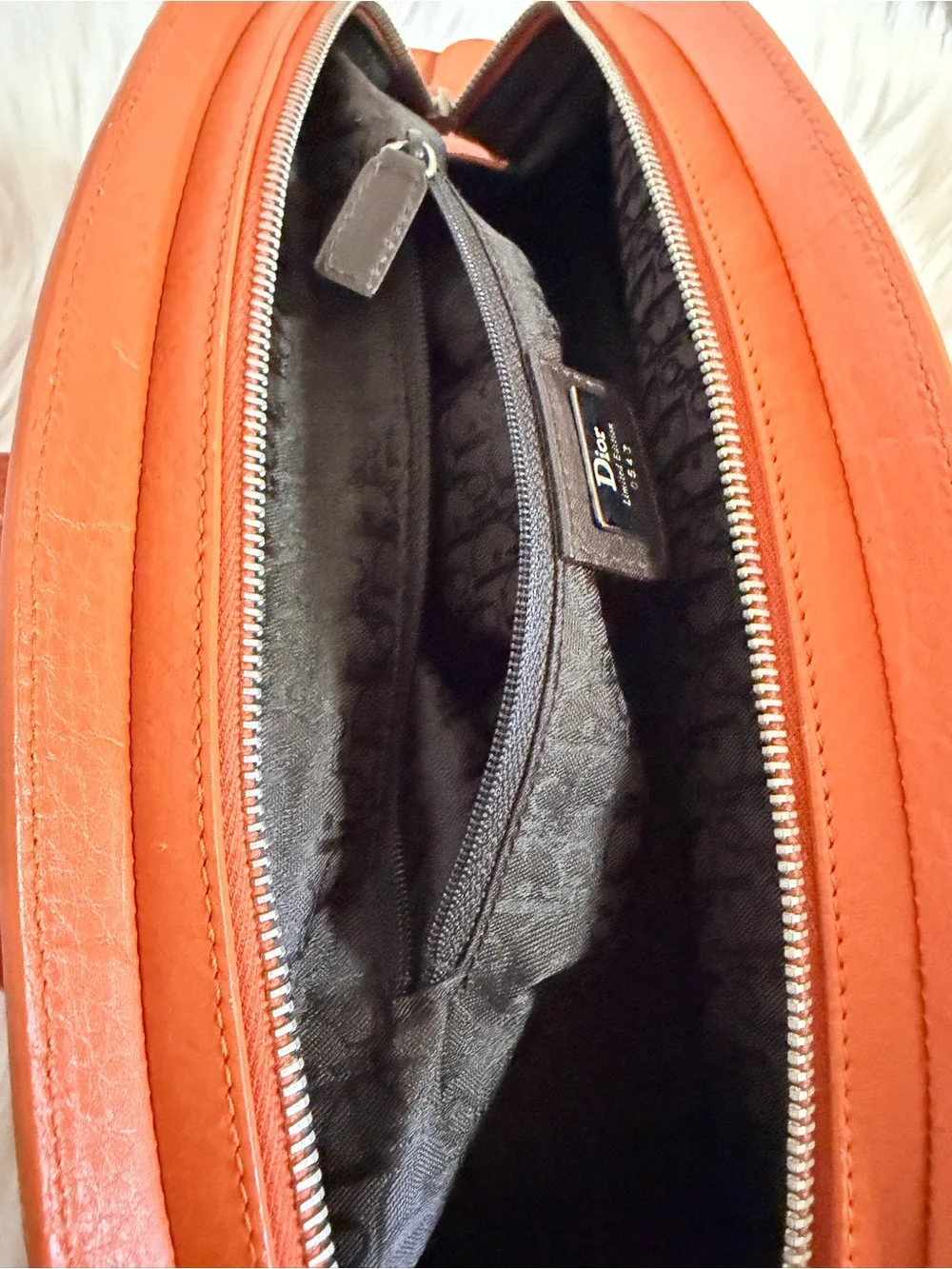 Dior Limited Edition Orange Leather Top-Handle Bag.